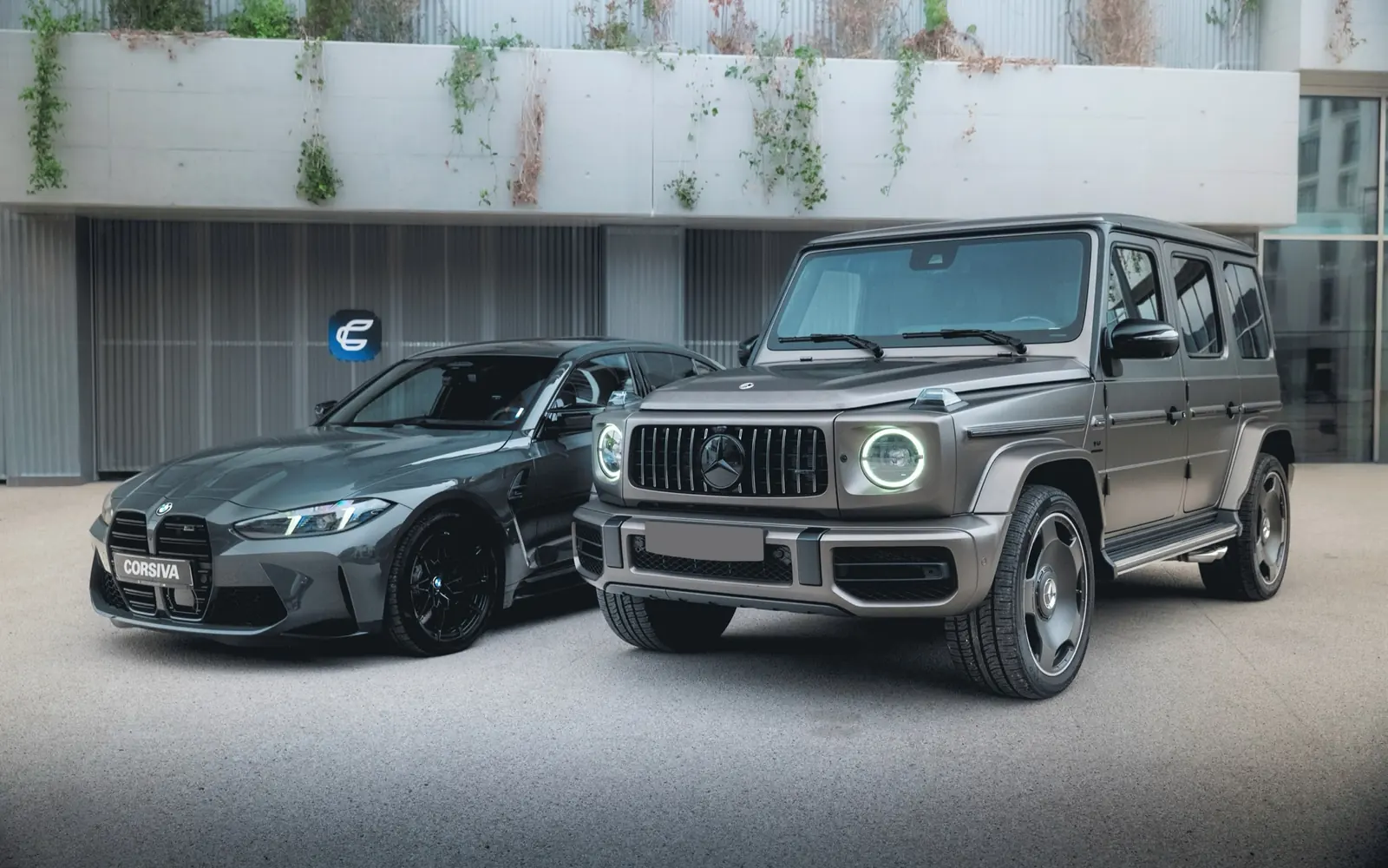 Mercedes-AMG G 63 2025 et BMW M3 devant les box
